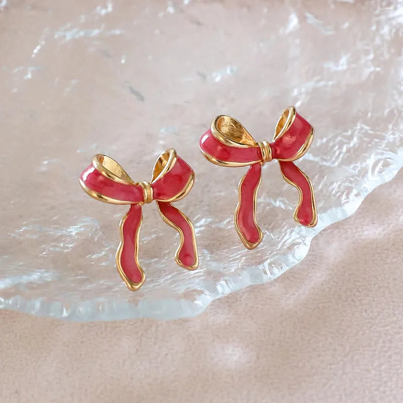Blush Bow Studs